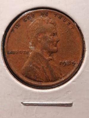 Side-by-side comparison of a normal 1935 wheat penny and the 1935 DDO FS-101 doubled die obverse, showing doubling on IN GOD WE TRUST
